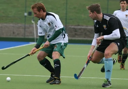 University of Exeter hockey skipper Ian Haley shadowed by Cardiff's Swedish defender Henry Eriksson image courtesy & copyright Tom Haigh